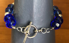 Load image into Gallery viewer, Faceted blue glass and silver bracelet
